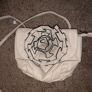 Small baige purse with crossbody strap